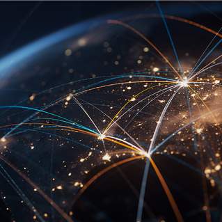 Digital visualization of global network connections with illuminated pathways over Earth